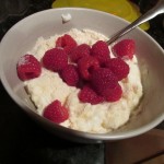 Stir the protein in, then the raspberries